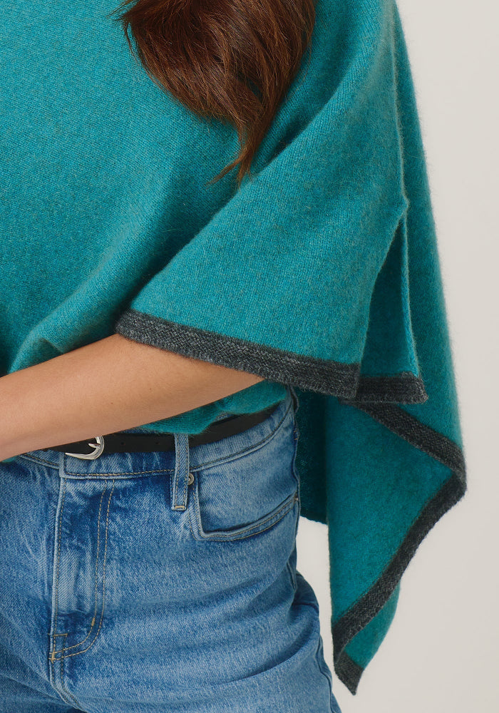 Possum and Merino

1623 Two Tone Poncho - A fan favourite, the Two Tone Poncho is a winner. With a relaxed fit and contrast coloured tipping it's cut for comfort and style. With a rainbow of colour options on offer, this is one you'll want in each colour! Classic fit.&nbsp;

Made in New Zealand from an exclusive Merinomink blend of 50% ZQ Merino, 40% Brushtail possum and 10% Mulberry silk.