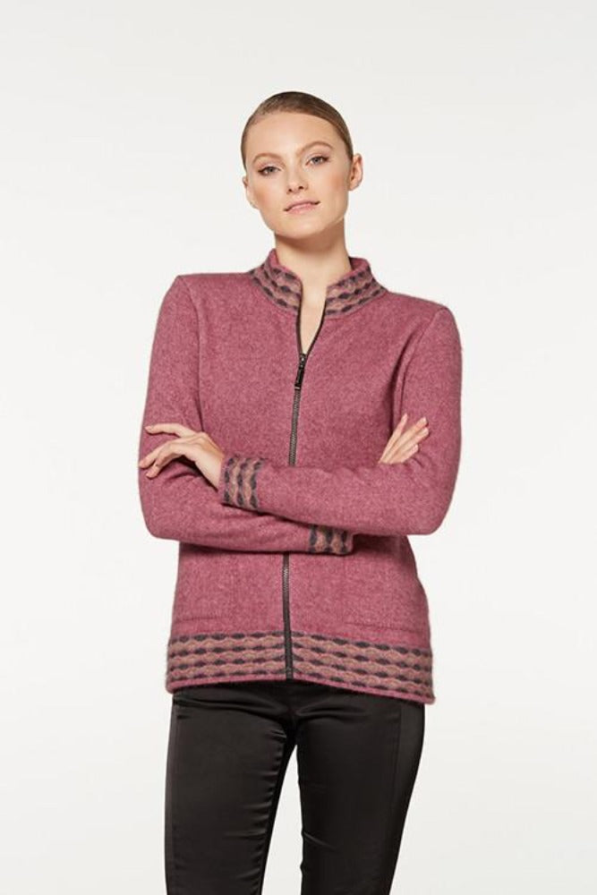Possum and Merino.  5000 Wave Trim Zip Cardigan - is casual comfort at it's finest. The natural fibres of Possum Merino blended with Mulberry silk provide a luxurious comfort that will see this cardigan become your favourite go-to piece.  Hip-length zip up cardigan Detailed wave pattern trim Mid-weight warmth 35% Possum Fur, 55% Merino Wool, 10% Pure Mulberry Silk Proudly made in New Zealand