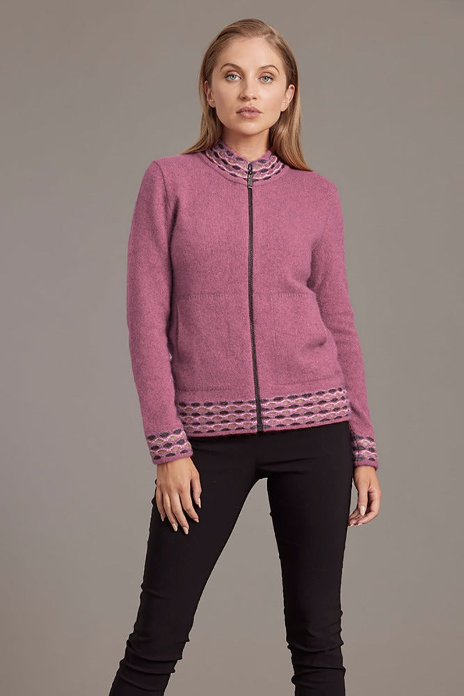 Possum and Merino.  5000 Wave Trim Zip Cardigan - is casual comfort at it's finest. The natural fibres of Possum Merino blended with Mulberry silk provide a luxurious comfort that will see this cardigan become your favourite go-to piece.  Hip-length zip up cardigan Detailed wave pattern trim Mid-weight warmth 35% Possum Fur, 55% Merino Wool, 10% Pure Mulberry Silk Proudly made in New Zealand