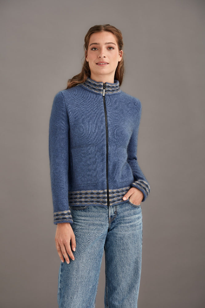 Possum and Merino.  5000 Wave Trim Zip Cardigan - is casual comfort at it's finest. The natural fibres of Possum Merino blended with Mulberry silk provide a luxurious comfort that will see this cardigan become your favourite go-to piece.  Hip-length zip up cardigan Detailed wave pattern trim Mid-weight warmth 35% Possum Fur, 55% Merino Wool, 10% Pure Mulberry Silk Proudly made in New Zealand