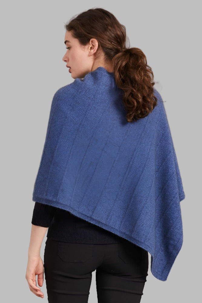 5007 Garter Detail Poncho - Elegance made easy with this garter detail.  Featuring diagonal garter detail and an asymmetric neck line, this piece is versatile and stylish.  35% Possum Fur, 55% Merino Wool, 10% Pure Mulberry Silk New Zealand designed and made Natural and sustainable One Size fits most