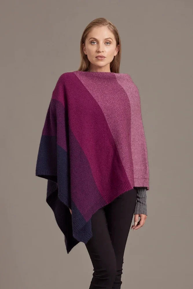 Possum and Merino

5010 Ombre Poncho - Our signature Ombre Poncho is available in five beautiful colour combinations. The incredible drape and classic style of this poncho will make it your go-to piece whenever there is a chill in the air.

Ombre Colour Pattern front and back
Mid-weight Warmth
35% Possum Fur, 55% Merino Wool, 10% Pure Mulberry Silk
New Zealand Designed and Manufactured

Natural and Sustainable
One Size Fits Most
Approximate size: Width 78 cm Length 66 cm.