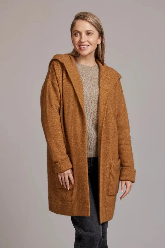 warmth and comfort, our Oversized Hood Jacket is ticking all the right boxes to become your new favourite overpiece of the season.  Mid weight Oversized Hood Two Front Pockets 35% Possum Fur, 55% Merino Wool, 10% Pure Mulberry Silk New Zealand designed and manufactured Generous Fit Natural and Sustainable