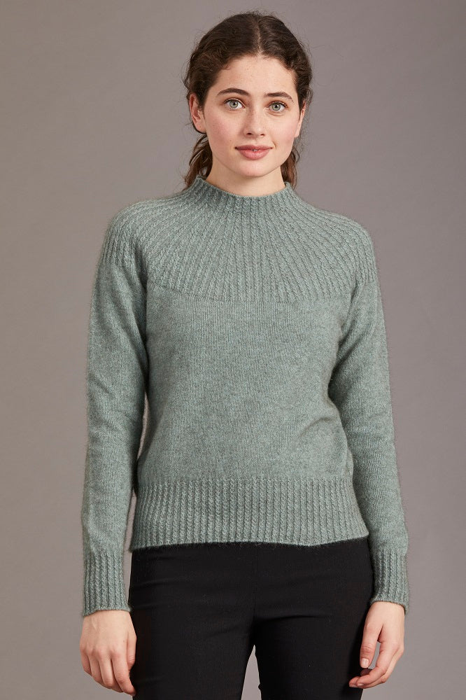 Possum and Merino.  5017 Yoke Neck Cable Jersey - The Yolk Neck feature with mini cable detail on this new addition to our jersey range is lovely, feminine and very flattering. From weekend jeans to high waist skirts and trousers, we keep finding new and exciting ways to enjoy its easy elegance.      Mid weight knit for warmth and comfort Mini Cable Detail 35% Possum Fur, 55% Merino Wool, 10% Pure Mulberry Silk New Zealand Designed and Manufactured Natural and Sustainable