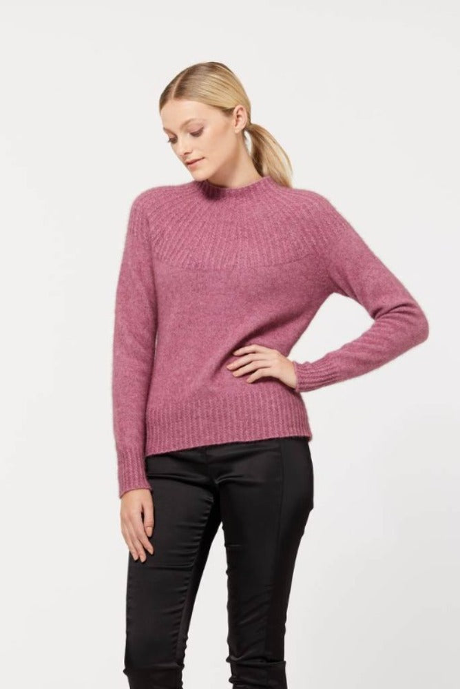 Possum and Merino.  5017 Yoke Neck Cable Jersey - The Yolk Neck feature with mini cable detail on this new addition to our jersey range is lovely, feminine and very flattering. From weekend jeans to high waist skirts and trousers, we keep finding new and exciting ways to enjoy its easy elegance.      Mid weight knit for warmth and comfort Mini Cable Detail 35% Possum Fur, 55% Merino Wool, 10% Pure Mulberry Silk New Zealand Designed and Manufactured Natural and Sustainable