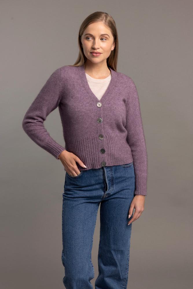 Possum and Merino  5034 Rib Cardi is knitted using our carefully sourced Natural Fibre blend of Possum Fur, Merino Wool and Mulberry Silk and finished with feature Shell Buttons, our Possum Merino Rib Cardi is a gorgeous take on a classic cardigan.  Rib detailing on the sleeve and hem partnered with a Deep V Neckline help to create a timeless, tailored look.
