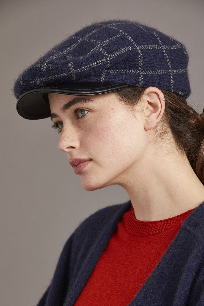 6081 Check Pattern Cheesecutter (with Lambskin Peak) - This is the classic Possum Merino men's cheesecutter to keep one's head warm while delivering timeless sophistication. The genuine lambskin leather peak compliments the design which has been specially crafted for you. Make it a great gift or keep one for yourself.