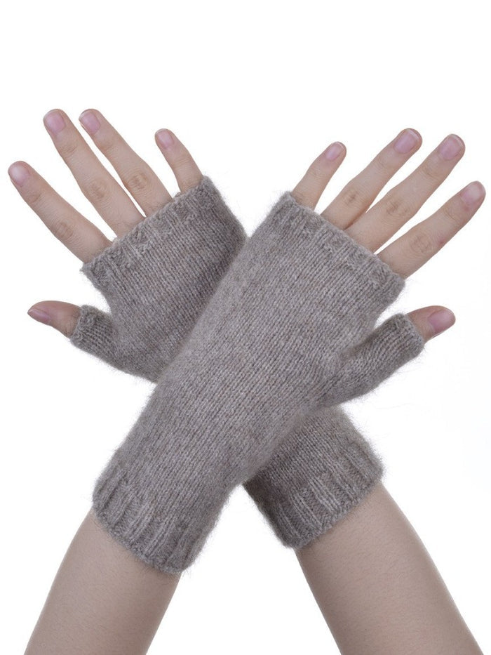 6105 Short Plain Glovelet - These gloves are a classic essential you won't want to leave the house without. Our lightweight glovelets will keep your hands beautifully snug and have the freedom of open fingers so there is no need to remove them when you are out and about!