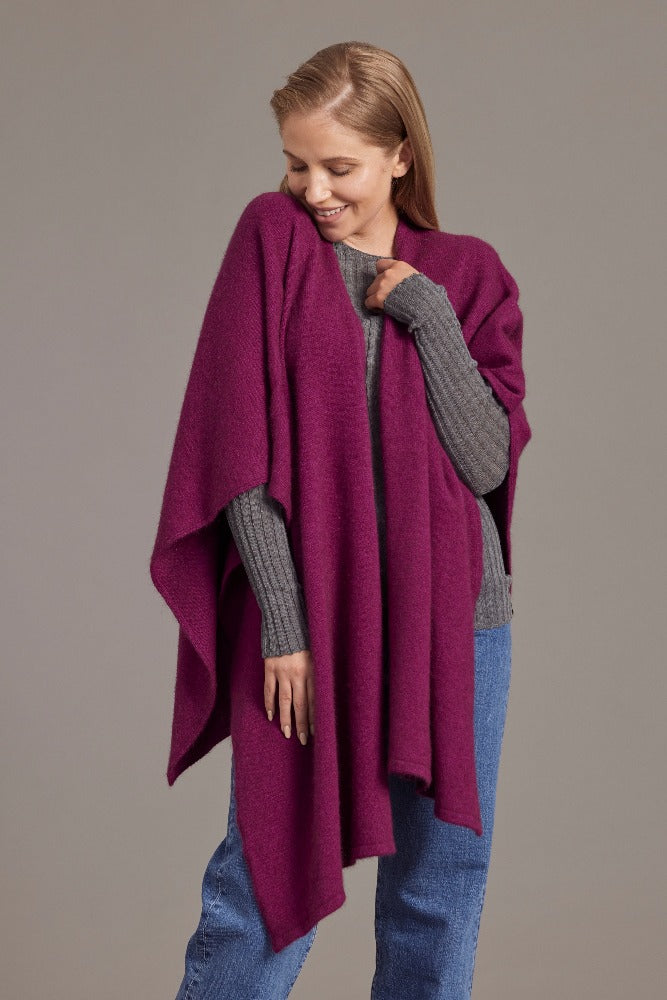 616 Split Front Cape - This cape blurs the line between art-piece and clothing.  It impresses with its form and function, artfully draping on the body while keeping you exceptionally warm.  The merino and possum fibres combine with delicate mulberry silk to create something superb - warmth, sophistication and beauty.  Size: approximately 80 cm x 102 cm.