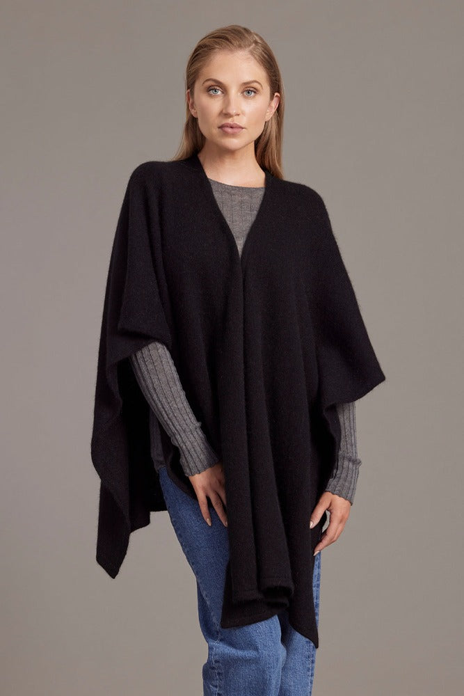 616 Split Front Cape - This cape blurs the line between art-piece and clothing.  It impresses with its form and function, artfully draping on the body while keeping you exceptionally warm.  The merino and possum fibres combine with delicate mulberry silk to create something superb - warmth, sophistication and beauty.  Size: approximately 80 cm x 102 cm.