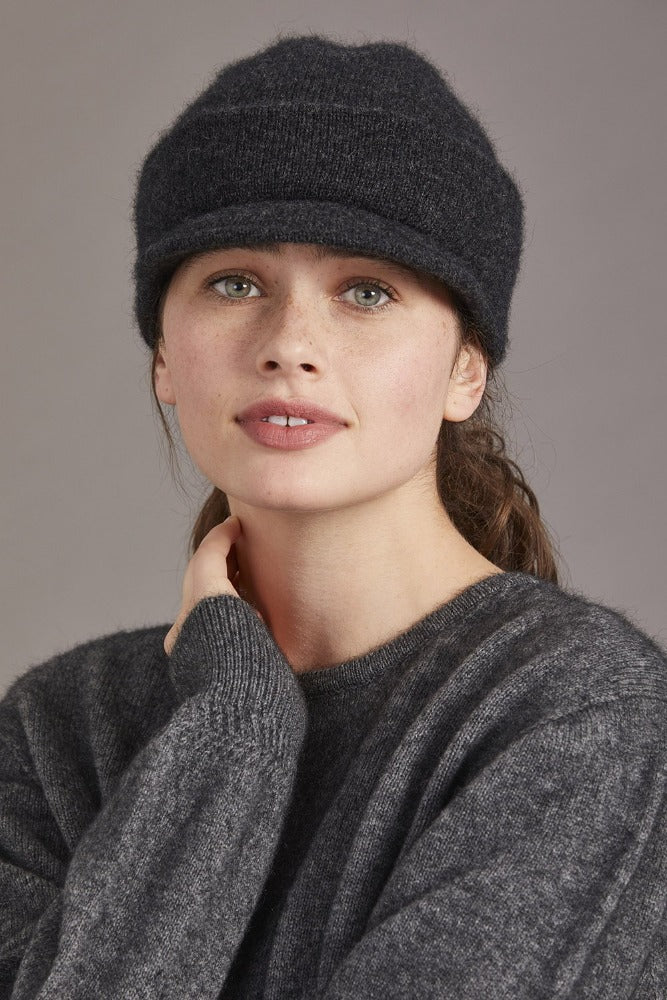 Possum and Merino  623 Cap with Peak is a versatile cap that can be worn anywhere, at anytime and with anything - an absolute essential.  Made from Possum Merino and blended with the Luxurious Mulberry Silk, McDonald’s Cap with Peak is a must have.  With a wide range of colours to choose from, you’ll be lost without one of these!