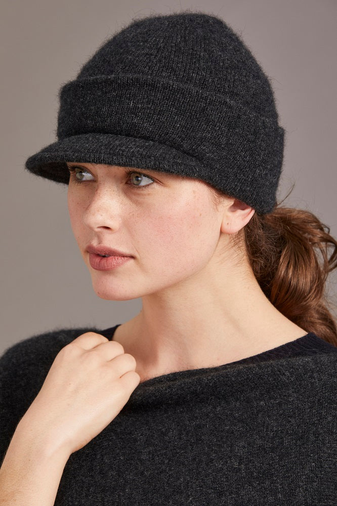Possum and Merino  623 Cap with Peak is a versatile cap that can be worn anywhere, at anytime and with anything - an absolute essential.  Made from Possum Merino and blended with the Luxurious Mulberry Silk, McDonald’s Cap with Peak is a must have.  With a wide range of colours to choose from, you’ll be lost without one of these!