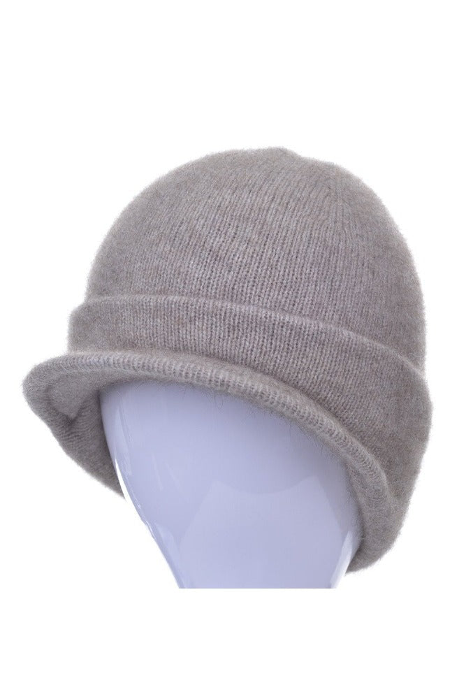Possum and Merino  623 Cap with Peak is a versatile cap that can be worn anywhere, at anytime and with anything - an absolute essential.  Made from Possum Merino and blended with the Luxurious Mulberry Silk, McDonald’s Cap with Peak is a must have.  With a wide range of colours to choose from, you’ll be lost without one of these!