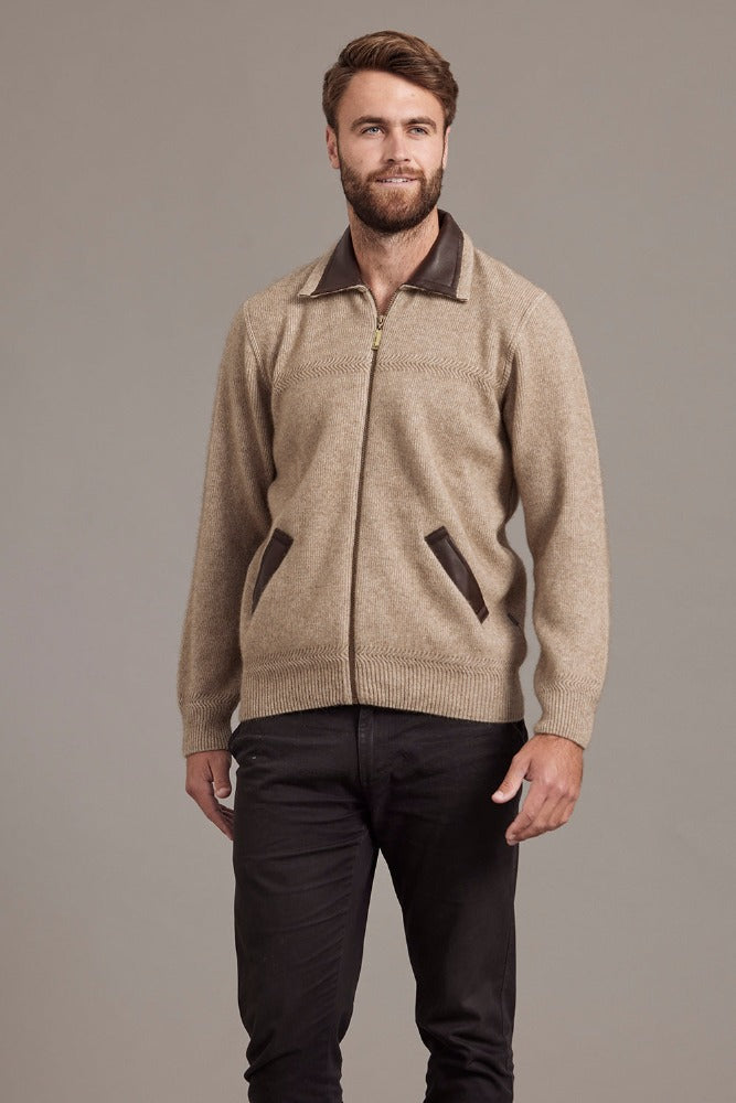 649 Lambskin Collar Jacket - A classic jacket to rule them all.  A masterpiece of workmanship that combines New Zealand Merino wool, Possum fur with Mulberry Silk and high quality lambskin into luxury.  The lambskin collar and pockets sit beautifully among a rack-stitch knit at the front and a