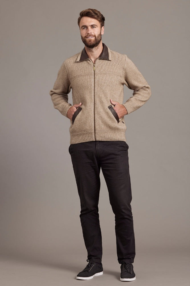649 Lambskin Collar Jacket - A classic jacket to rule them all.  A masterpiece of workmanship that combines New Zealand Merino wool, Possum fur with Mulberry Silk and high quality lambskin into luxury.  The lambskin collar and pockets sit beautifully among a rack-stitch knit at the front and a