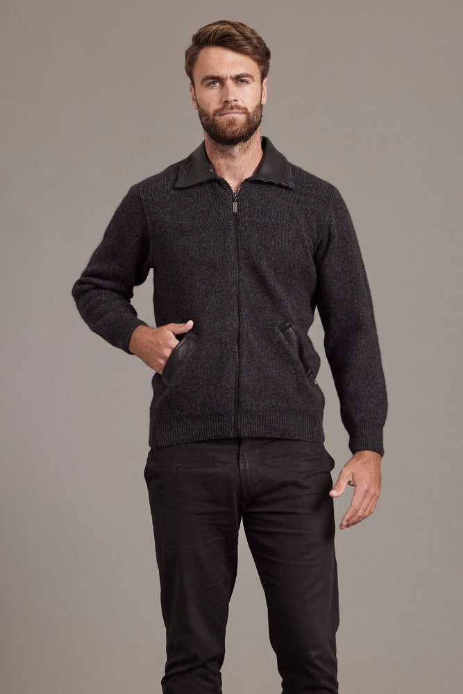 649 Lambskin Collar Jacket - A classic jacket to rule them all.  A masterpiece of workmanship that combines New Zealand Merino wool, Possum fur with Mulberry Silk and high quality lambskin into luxury.  The lambskin collar and pockets sit beautifully among a rack-stitch knit at the front and a