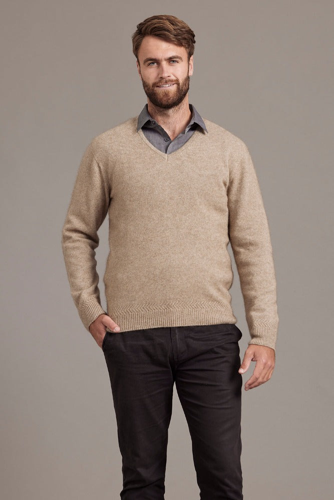 Possum and Merino  6601 Rack Stitch V-Neck Jersey - Whether you’re out for the night or in the wild, this timeless V-neck jersey will get you through the elements in style. Nature’s finest natural fibres are brought together with quality workmanship for comfort and warmth. A V-neckline combines with feature rack-stitch waistband and cuffs to keep things effortlessly casual.
