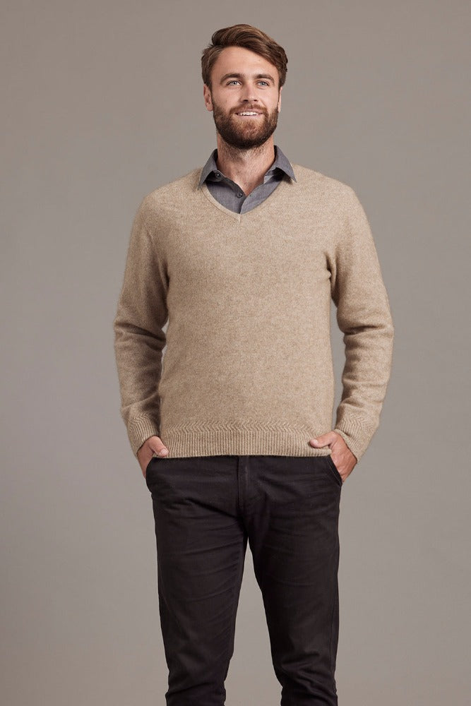 Possum and Merino  6601 Rack Stitch V-Neck Jersey - Whether you’re out for the night or in the wild, this timeless V-neck jersey will get you through the elements in style. Nature’s finest natural fibres are brought together with quality workmanship for comfort and warmth. A V-neckline combines with feature rack-stitch waistband and cuffs to keep things effortlessly casual.