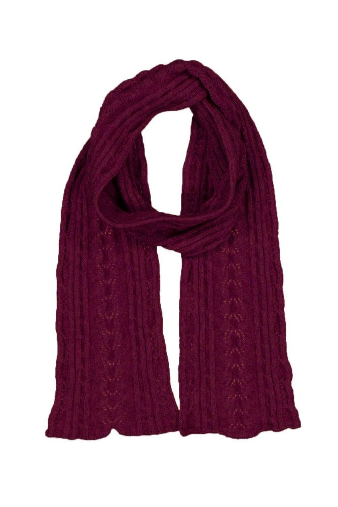 669 Cable Scarf - Feel the luxurious warmth as you wrap this beautifully soft scarf on your neck. Style by adding a touch of colour to your neutral outfit or toning down a bright outfit with your selection from our beautiful range of colours. McDonald NZ’s Possum Merino and Mulberry Silk Cable Scarf features the intricate detail of the cable knit structure. An essential accessory for every wardrobe.