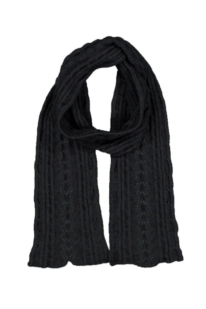669 Cable Scarf - Feel the luxurious warmth as you wrap this beautifully soft scarf on your neck. Style by adding a touch of colour to your neutral outfit or toning down a bright outfit with your selection from our beautiful range of colours. McDonald NZ’s Possum Merino and Mulberry Silk Cable Scarf features the intricate detail of the cable knit structure. An essential accessory for every wardrobe.