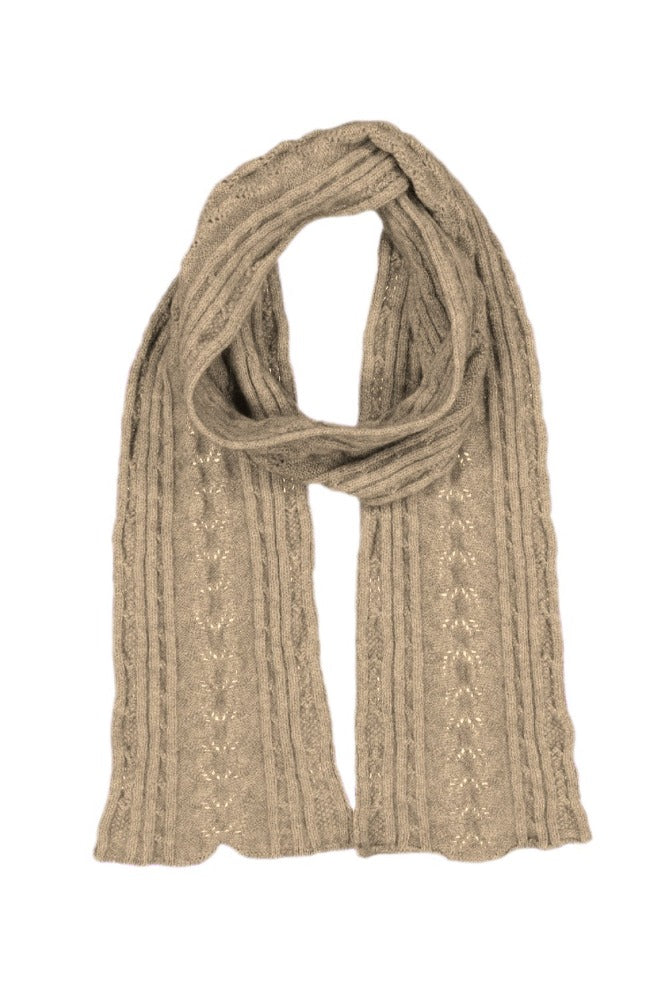 669 Cable Scarf - Feel the luxurious warmth as you wrap this beautifully soft scarf on your neck. Style by adding a touch of colour to your neutral outfit or toning down a bright outfit with your selection from our beautiful range of colours. McDonald NZ’s Possum Merino and Mulberry Silk Cable Scarf features the intricate detail of the cable knit structure. An essential accessory for every wardrobe.