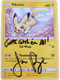 Pikachu trading card with signature by JP and text on a yellow border