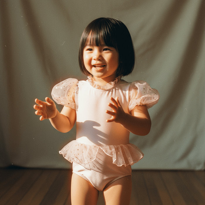 Petit Playa Ballet Swimsuit in Fairy Pink print, sun-safe UPF50+ swimwear for babies and girls