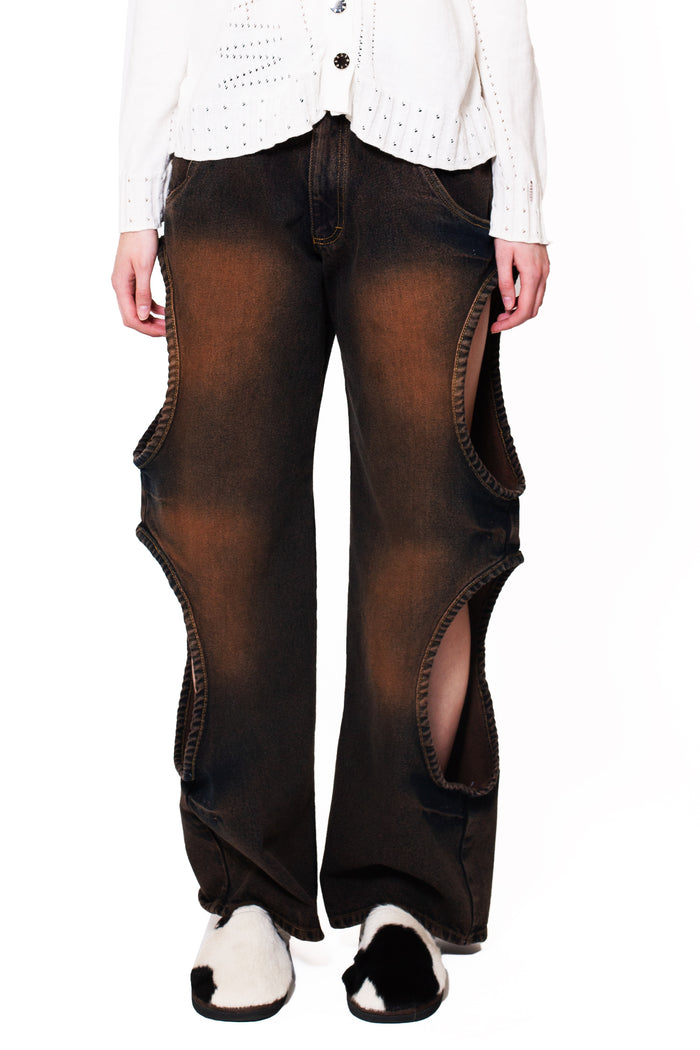 MANCANDY Bite Jeans® Rodeo in indigo brown cotton denim featuring signature side cut-outs and a flared leg silhouette.