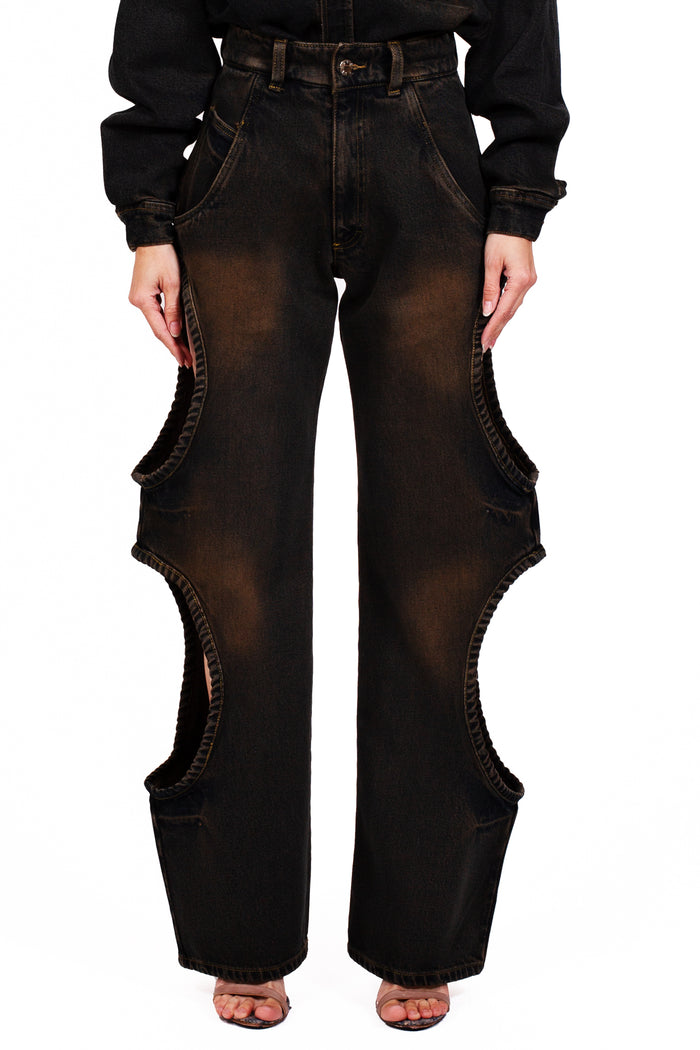 MANCANDY Bite Jeans® Rodeo in indigo brown cotton denim featuring signature side cut-outs and a flared leg silhouette.