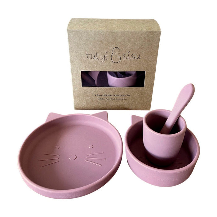 A 4 piece cat-themed silicone dinnerware set in dusty rose color, including a suction plate, suction bowl, spoon, and cup, displayed alongside its packaging box.