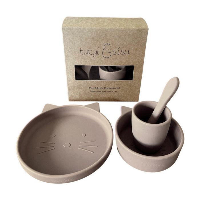 A 4 piece silicone suction dinnerware set for babies presented in a sand color, including a suction plate, suction bowl, spoon, and cup, with packaging box in the background.