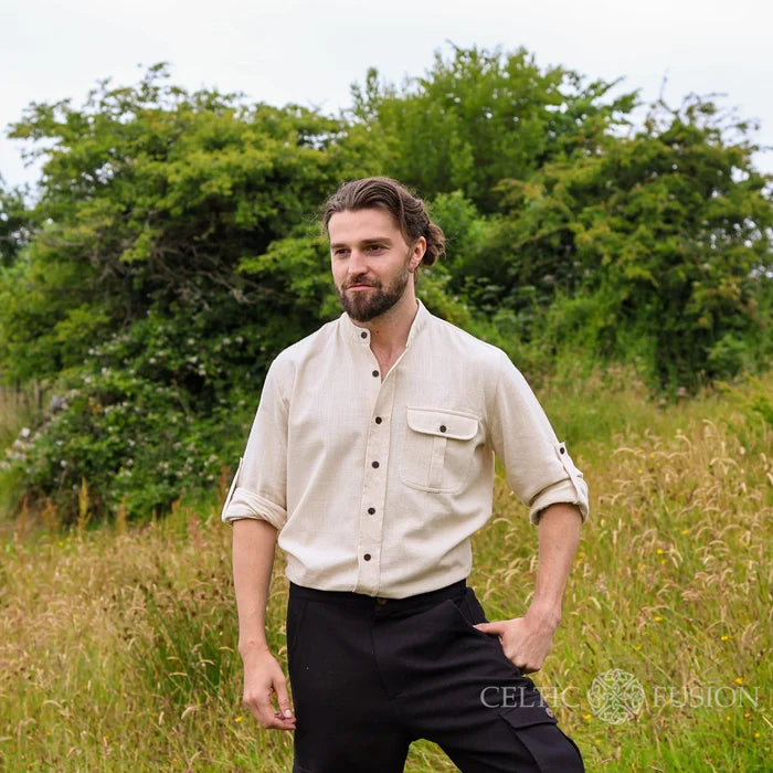 Celtic Shield Collarless Shirt in white with rolled sleeves, a Celtic collarless dress shirt for men designed by Irish Celtic Fusion Design