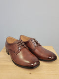 Brown dress shoes for boys.