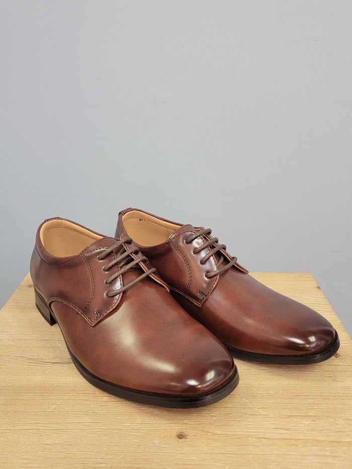 Brown dress shoes for boys.