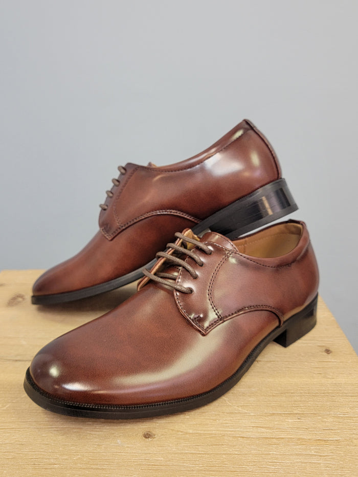 Brown dress shoes for boys.