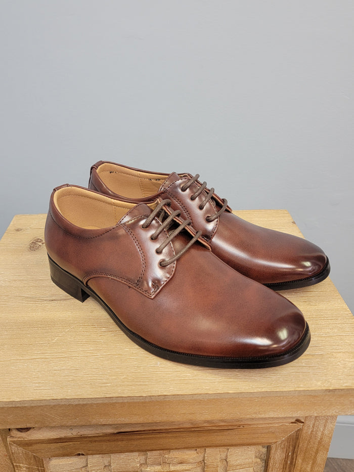 Brown dress shoes for boys.