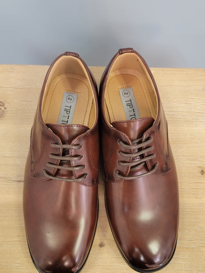 Brown dress shoes for boys.