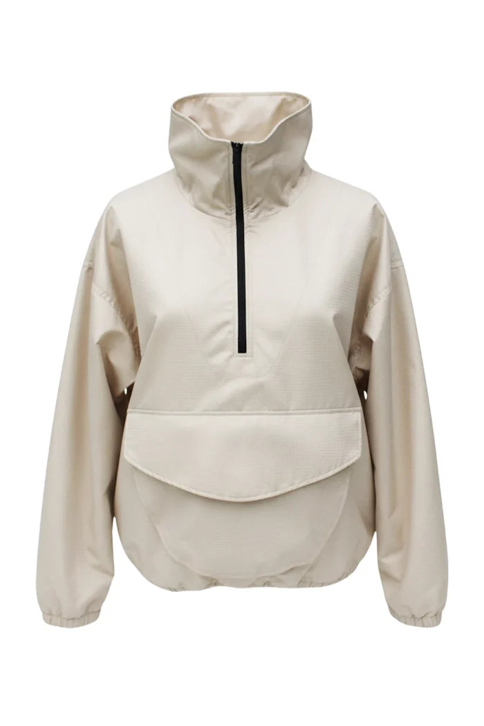 MANCANDY City Shell Half-Zip in lightweight nylon featuring a relaxed silhouette, half-zip neckline and front kangaroo pocket.