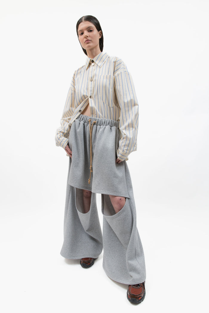 MANCANDY Deconstructed Sweatpants in grey heavyweight fleece featuring oversized wide legs, front cut-outs and extended length.