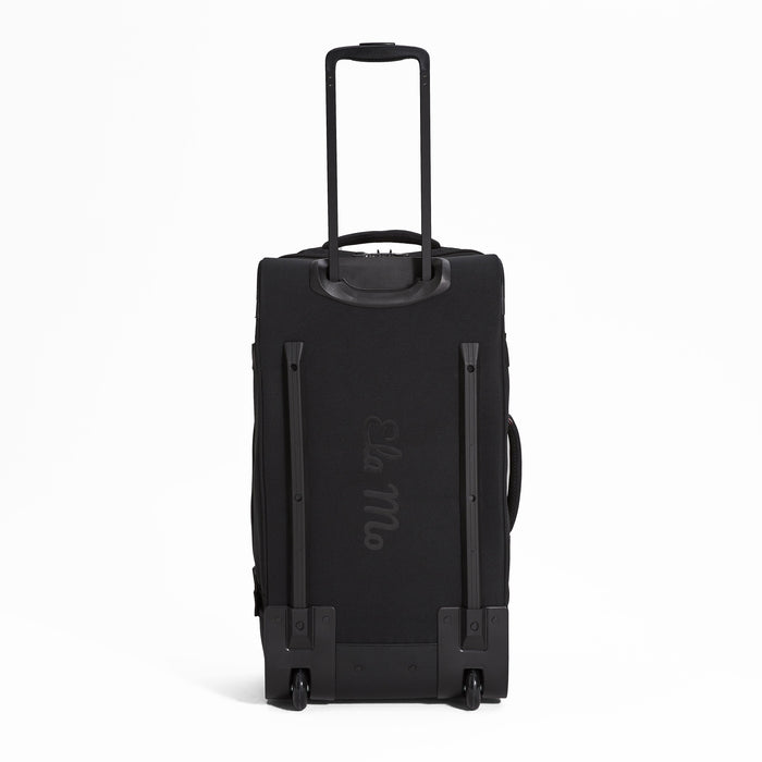 Ela Mo™ Reisetasche mit Rollen 78 Liter | Black. Die Rückseite der Reisetasche mit Rollen und Herstellerlogo in der Mitte.