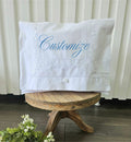 White envelope with custom embroidery.