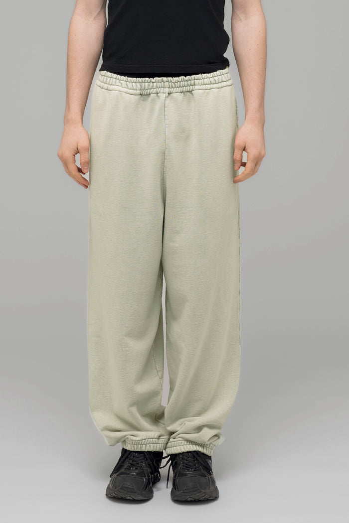 "HARDCORE WELLNESS" OVERSIZED SWEATPANTS - 032c