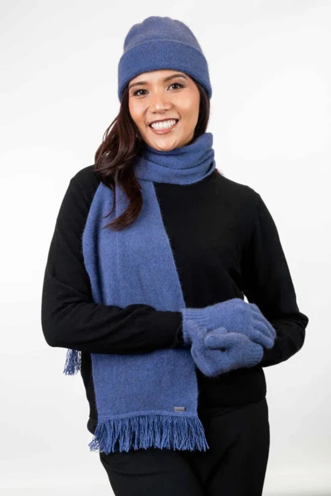 Possum and Merino  KO114 Scarf with Fringe -  A plain scarf with fringing which is generous in width and length.  Makes a set with KO159 Plain Beanie and KO48 Plain Gloves.  One Size - Approx. 22cm wide x 160cm long.  Made proudly in New Zealand from a premium blend of 40% possum fur, 50% merino lambswool & 10% mulberry silk.