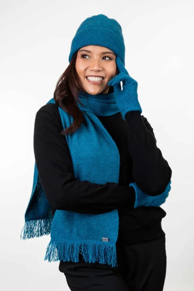 Possum and Merino  KO114 Scarf with Fringe -  A plain scarf with fringing which is generous in width and length.  Makes a set with KO159 Plain Beanie and KO48 Plain Gloves.  One Size - Approx. 22cm wide x 160cm long.  Made proudly in New Zealand from a premium blend of 40% possum fur, 50% merino lambswool & 10% mulberry silk.