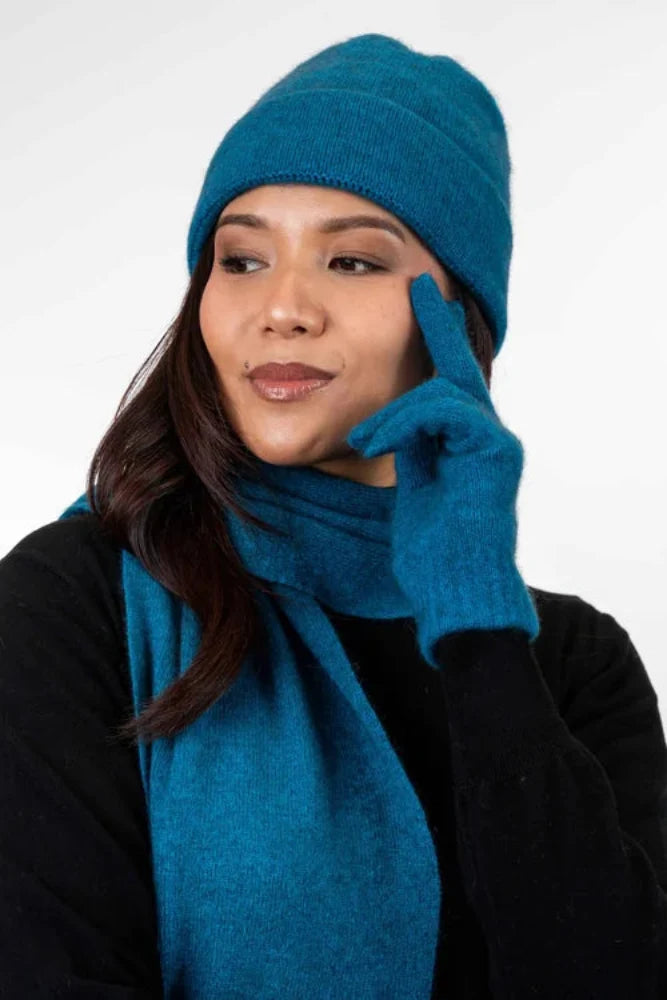Possum and Merino  KO159 Plain Beanie - A plain, double layer beanie with a turned back edge and metal Koru badge.  Makes a set with KO114 Scarf with Fringe and KO48 Plain Gloves.   One Size.  Made proudly in New Zealand from a premium blend