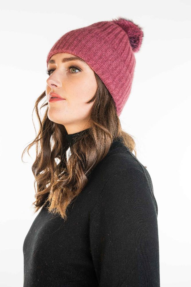 Possum and Merino.  KO2013 Fur Pom Pom Beanie - This Fur Pom Pom Beanie is made from a luxurious blend of possum fur and superfine New Zealand Merino wool.  So soft and warm you’ll never want to take it off.  Make a set with KO1018 Fur Pom Pom Scarf.  One size.  Made proudly in New Zealand from a premium blend of 40% possum fur, 50% merino lambswool & 10% mulberry silk.