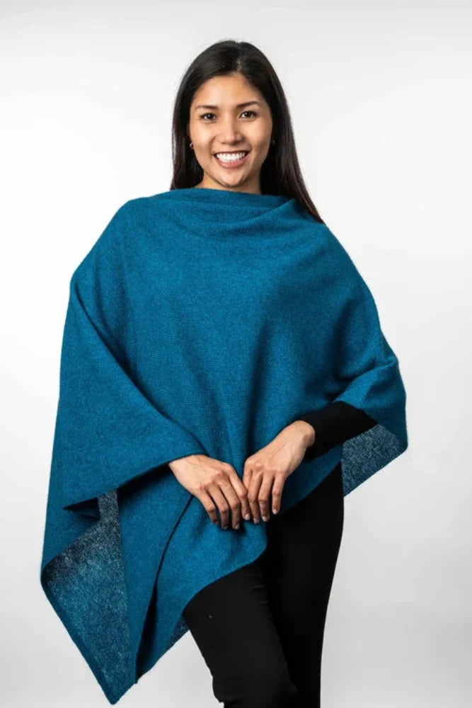 Possum and Merino  KO798 Two Way Poncho - This is a versatile and lightweight piece which can be worn two ways - with the hem either straight across or on the diagonal.   One Size   Made proudly in New Zealand from a premium blend of 40% possum fur, 50% merino lambswool & 10% mulberry silk.