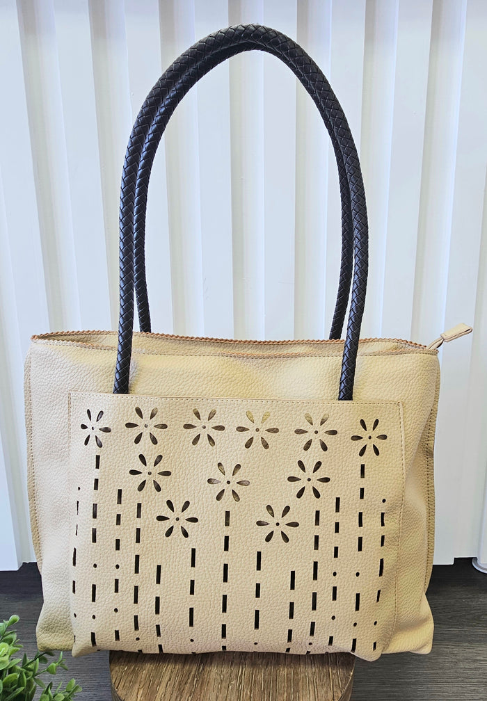 Tote bag with floral detail.