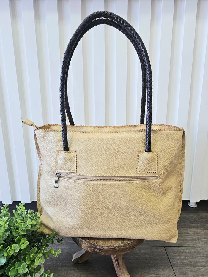 Back of bag with zipper pocket.