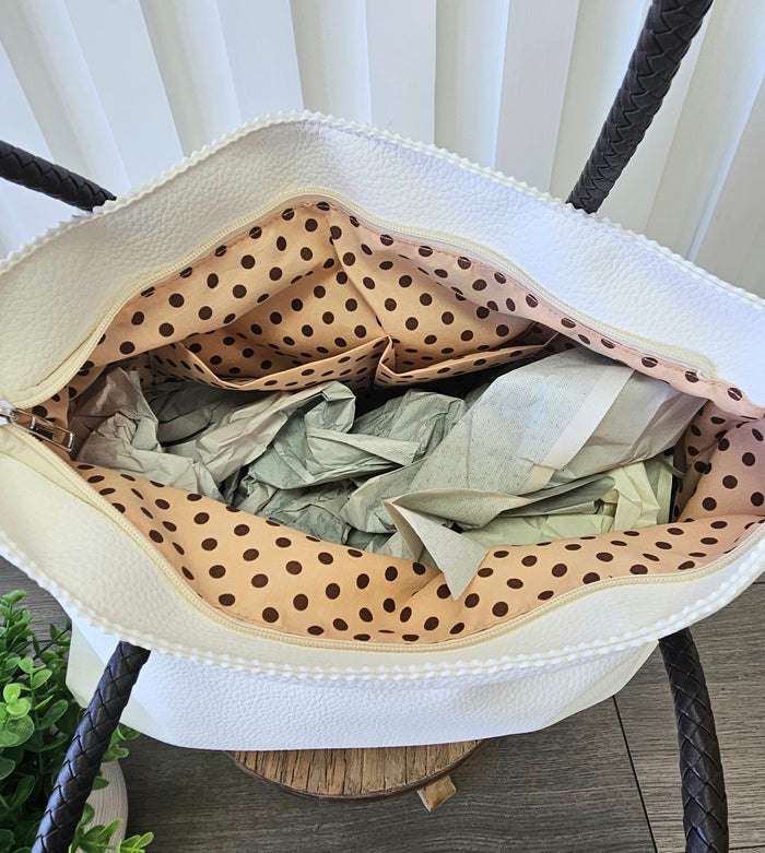 Open tote bag with pockets inside.
